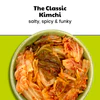 How is kimchi traditionally fermented?